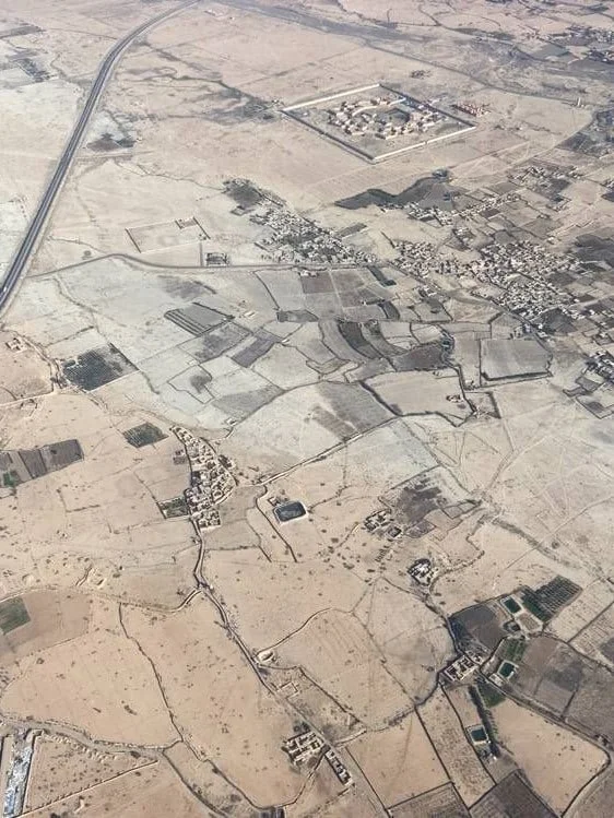 the look from an airplane on the landscape. a floorplan in sand colours